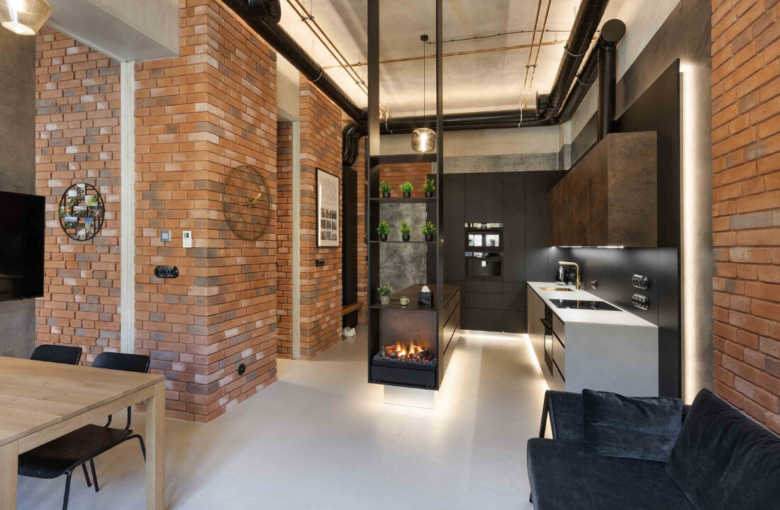 Byt pod Vyšehradem: jak může stěrka fungovat v celém interiéru